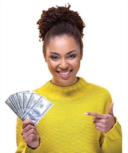 Woman holding money and smiling